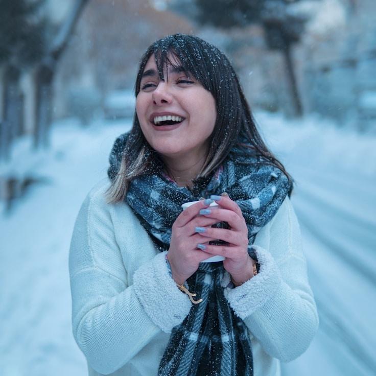 Avery Morgan, Lead Design Curator at Vivid Forest Network, reviewing corporate floral arrangements
